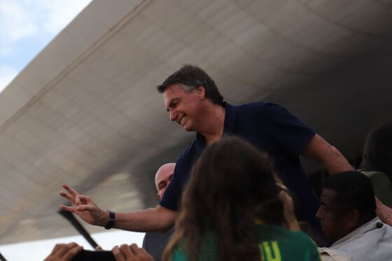 Bolsonaro, sorrindo, carreata, chegada, Cuiabá, evento, PL