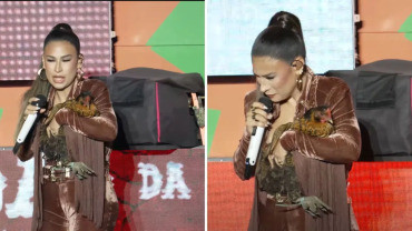 Simone Mendes é presenteada com galinha em show